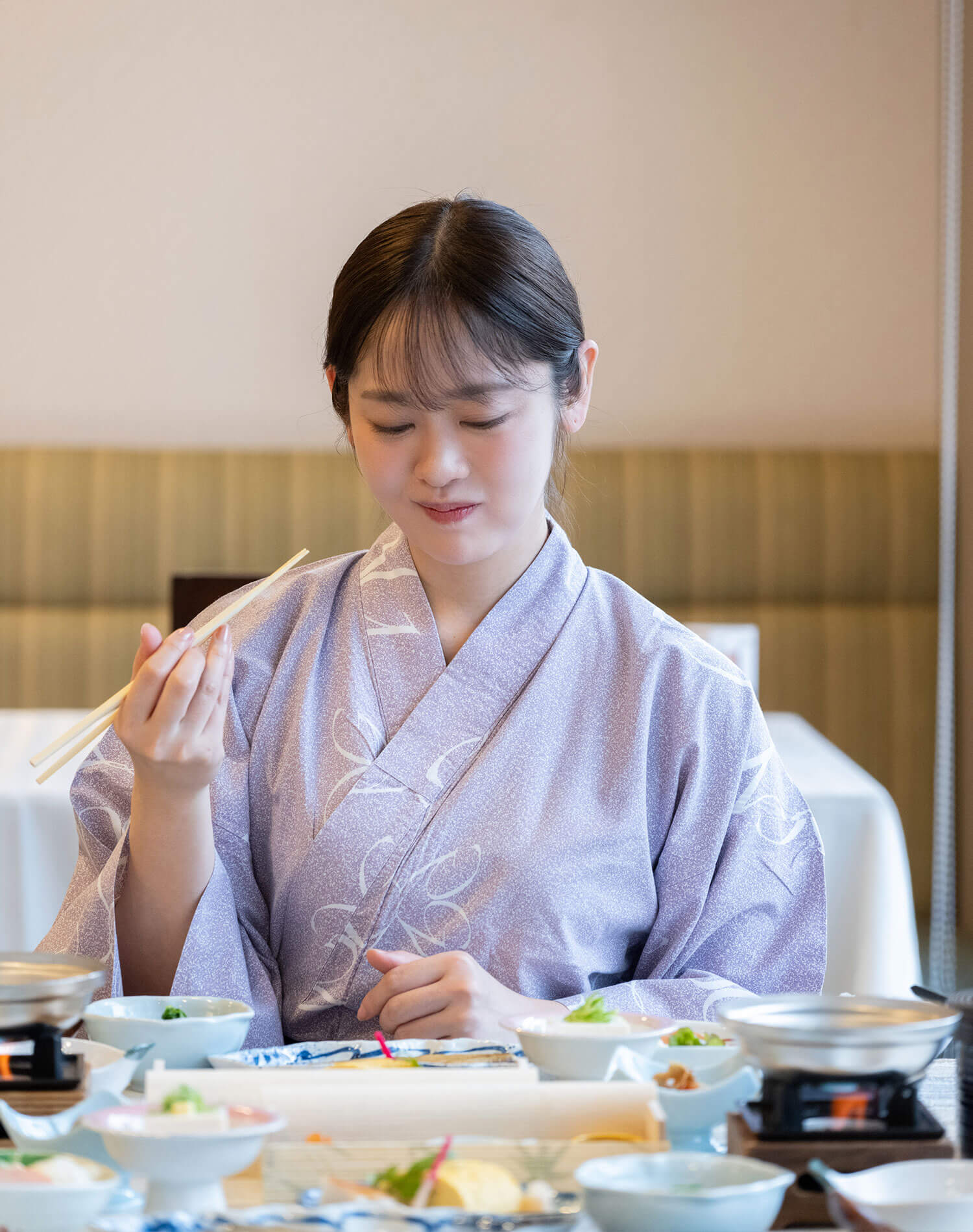 朝ごはんに舌鼓する池田さん